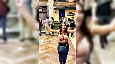 Brunette woman skipping rope in public, deep cleavage and bouncing boobs visible