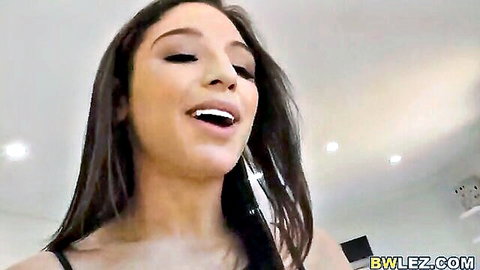 Young olive-skinned brunette with medium tits moans topless in ecstasy open mouth
