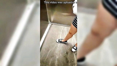 Bottomless babe flashes shaved pussy and ass in elevator upskirt