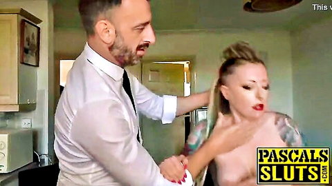 Tattooed busty blonde dominated by suited man grabbing hair