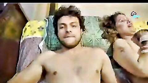 Curly-haired Indian couple topless and smiling in hot web series scene