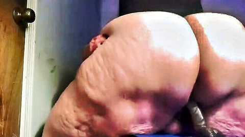 SSBBW bent over enjoying anal penetration with black sex toy