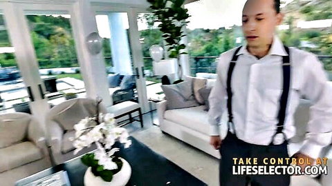 Elsa Jean wedding weekend scene with man in suspenders, luxurious home setting