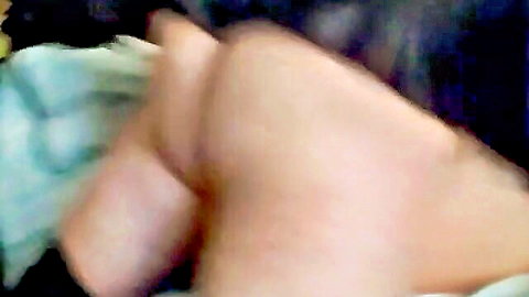 Blurry closeup of mature woman's hairy pussy and asshole exposed with blue panties pulled aside