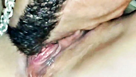 Bearded man's fingers deeply fucking wet pink pussy lips spread wide closeup