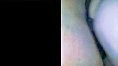 Blurry closeup of pale skin and curves in dark amateur porn tease