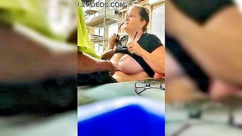 Busty brunette giving blowjob to black guy on lunch break