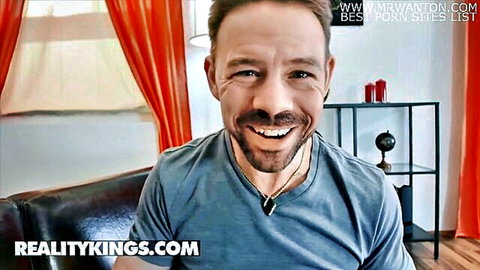 Erik Everhard smirks in Reality Kings preview with Silvia Dellai, teasing pants-cutting action