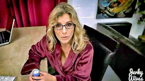 Cory Chase as blonde MILF in open silk robe holding blue pills