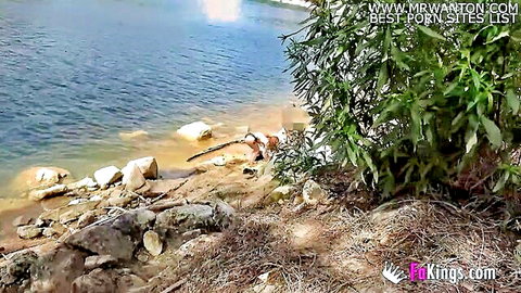 Redhead naked babe seduces naked dude outdoors and fucks on camera