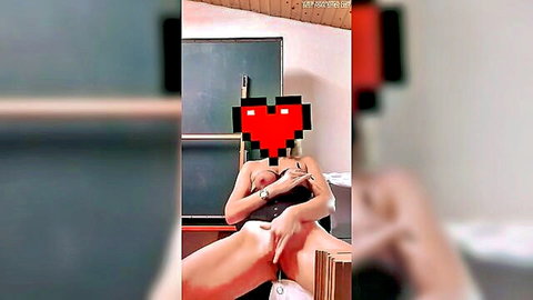 Nude woman spreads legs on classroom desk fingering wet pussy with tits exposed