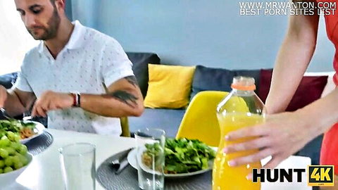 Brunette in red dress serves tattooed man at table in Hunt4K bride pickup scene