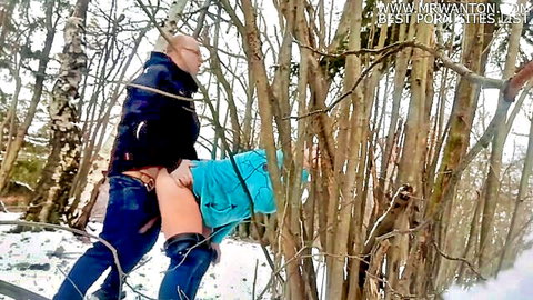 Couple fucking doggy style outdoors in snowy forest