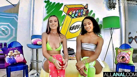 Haley Reed and Alexis Tae in colorful bikinis posing playfully