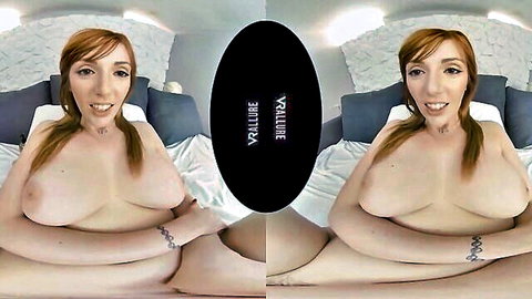 Curvy redhead with huge tits spreads legs exposing shaved pussy in VR POV solo