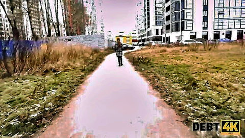 Alice Klay walks urban path in jeans, Debt4K debt scenario teaser