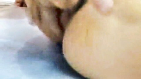 Petite fair-skinned girl bends over showing trimmed wet pussy and tight ass spread by hand