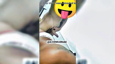Tattooed Latina pulls white panties aside fingering wet pussy in car mirror selfie