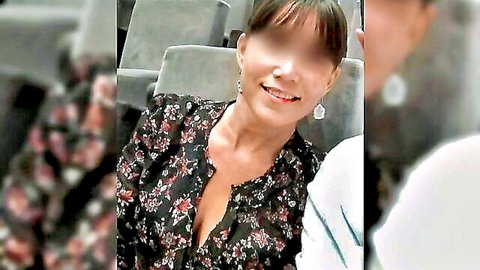 Princessenyleve French brunette smiling in low-cut floral dress