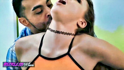 Gia Derza passionately neck-kissed by man in orange tank top, Reckless in Miami
