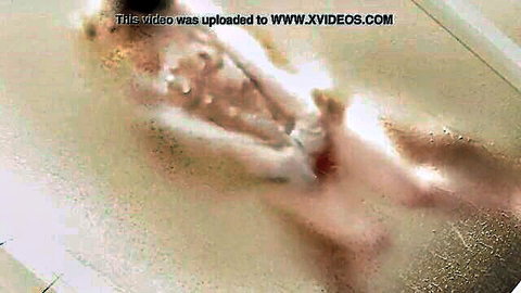 Blurry closeup of woman's stretched creamy pussy leaking thick cum after intense fucking