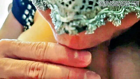 Masked slut in green lace opens mouth wide for man's fingers and cumshot