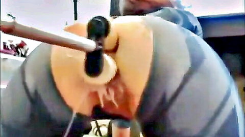 Large ass double penetrated by banging machine in gray leggings