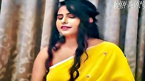 Sexy Indian babe in yellow saree smiling seductively with pouty lips teasing for cock suck
