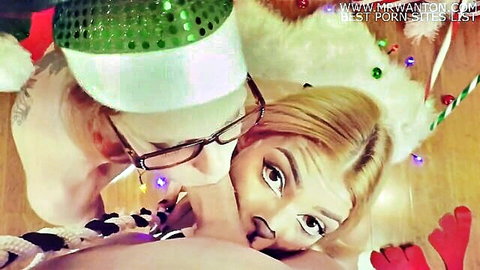 Blonde elf babe with big tits gets nipple sucked by Santa in Xmas threesome