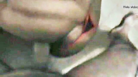 Close-up of woman with thick cock stuffed deep in her wide-open mouth during blowjob