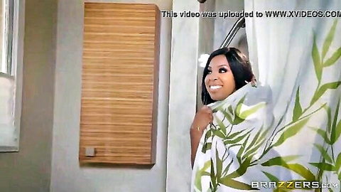 Aryana Adin smiling seductively peeking from shower curtain