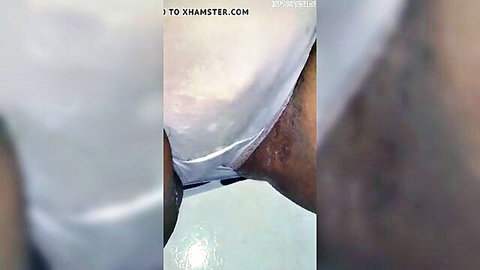 Close-up midnight solo male masturbation with exposed dark-skinned erect penis in white underwear