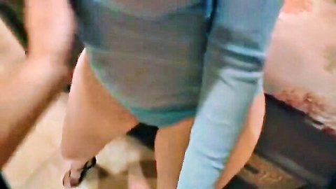 Man grips fair-skinned woman's exposed shaved pussy and big ass in blue bodysuit pulled aside from behind