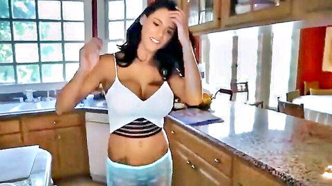 Peta Jensen brunette in tight white crop top showing big cleavage and blue shorts
