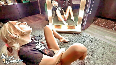 Blonde babe masturbates vagina with sex toys in front of mirror, intense orgasm