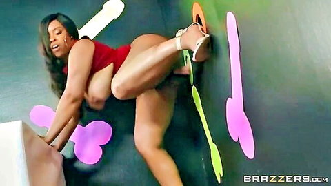 Aryana Adin in red dress, big tits and ass exposed in playful pose