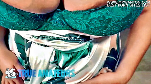 Chubby amateur babe in green lace lingerie with big cleavage and tropical wrap