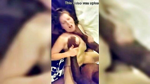 Nude white woman in missionary sex with black man