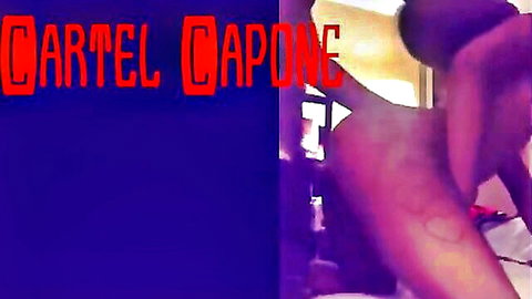 Ebony woman bent over naked, getting stuffed from behind in explicit scene