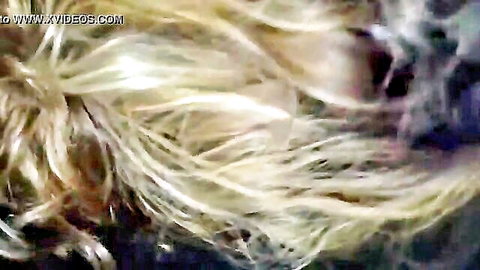 Blonde white woman in interracial threesome with two black men