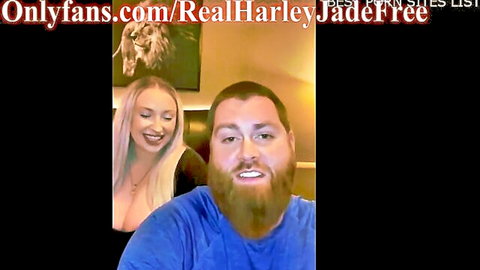 Blonde MILF RealHarleyJade teases deep cleavage with bearded guy smiling on webcam