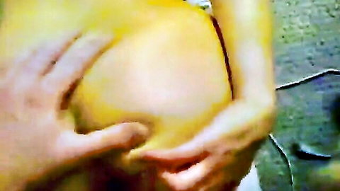 Strong hands gripping and spreading massive pale ass cheeks wide open