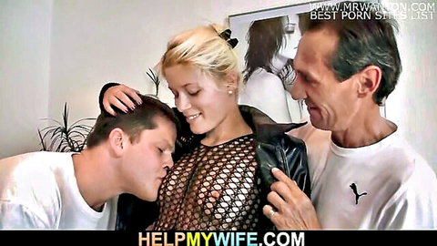 Blonde wife in fishnet top kissed on chest by two men in steamy threesome