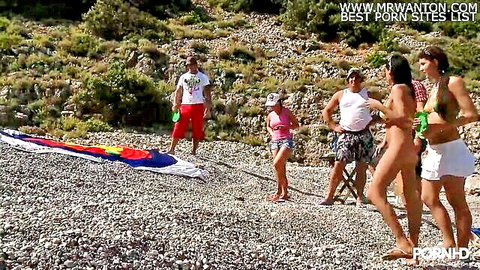 Naughty beach group sex tournament with nude women and mixed crowd