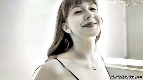 Thicc white girl strip tease in black lingerie, smiling seductively