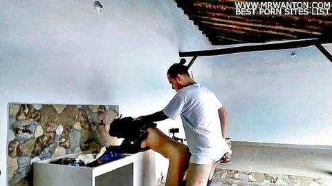 Maid fucked from behind while washing dishes in amateur video
