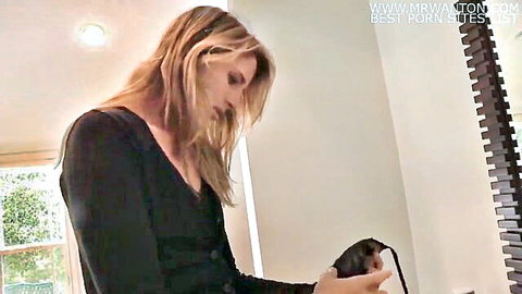 Blonde MILF in black dress teasing with vibrator in amateur home video
