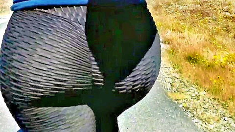 Curvy MILF in tight wedgie leggings flaunting big ass outdoors