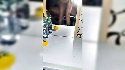Lora teasing with bare ass and legs in mirror solo
