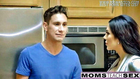 Seductive brunette MILF flirts with young boyfriend in shiny top